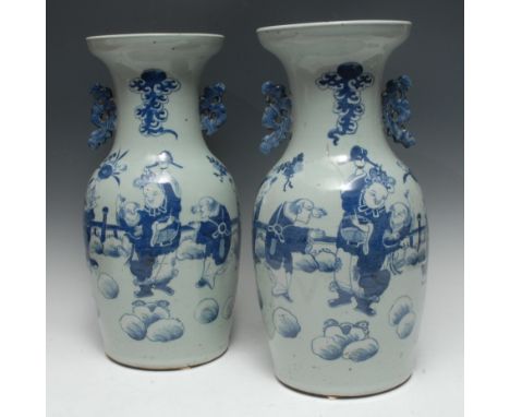A pair of tall Chinese baluster vases, painted in underglaze blue with robed playful figures and precious objects in a styliz