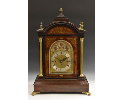 A substantial Victorian rosewood and brass marquetry musical bracket clock, 19cm arched brass dial inscribed with Roman and s