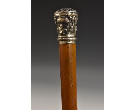 A 19th century Indian silver mounted walking stick, the domed pommel chased with figures and traditional buildings, inscribed