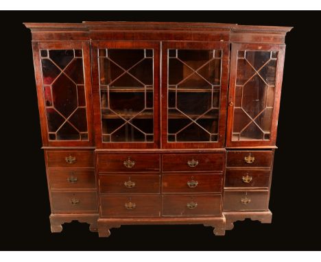 A 19th century mahogany bookcase, dentil cornice above an arrangement of astragal glazed doors, cockbeaded drawers and cupboa