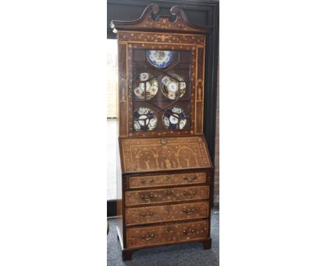 A George III mahogany and marquetry bureau bookcase, of small proportions, swan neck pediment above an astragal glazed doors,