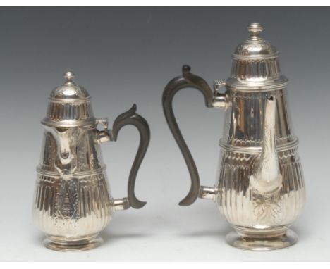 A Victorian silver side-handled cafe au lait service, comprising Queen Anne design half-fluted coffee pot and milk jug, hinge