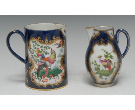 A Worcester spreading cylindrical mug, decorated with fanciful birds within a gilt cartouche on a scaled blue ground, 12.5cm 