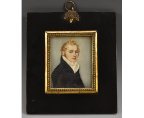 English School (19th century), a portrait miniature, of a young gentleman with curly blond hair, half length, wearing a blue 