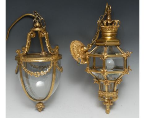 An 18th century style gilt metal hexagonal ceiling lantern, crown cresting above three rows of bevelled panes, acanthus bosse