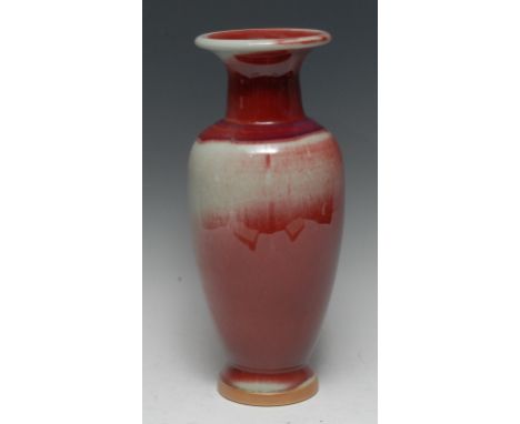 A Chinese monochrome peach bloom ovoid vase, flared rim, 35.5cm high, impressed seal mark