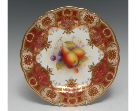 A Royal Worcester shaped circular cabinet plate, painted by John Freeman, signed, with ripe pears and cherries, scrolling mar