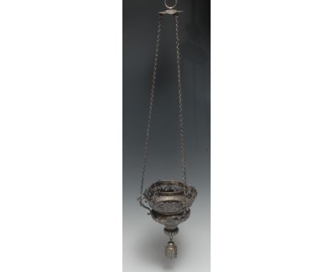 A Turkish silver hanging lamp, of ogee mosque lantern form, pierced and embossed with masks, flowers, scrolls and diapers, Tu