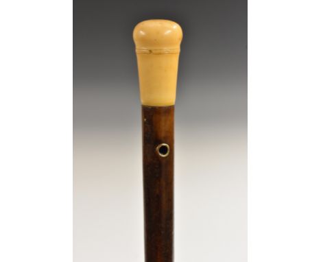 An early 18th century gentleman's yellow metal-mounted, ivory and hardwood walking stick, turned globular handle, suspension 