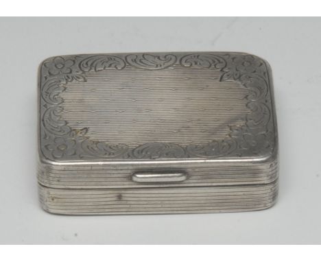 A Continental silver rounded rectangular snuff box, the hinged cover engine turned and engraved with a border of scrolling fo