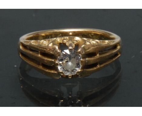 A gentleman's diamond solitaire ring, old round cut diamond approx 0.50ct, six rail open scroll cast shoulders, eight claws m