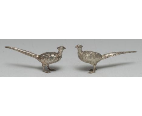 A pair of early 20th century silver novelty condiments, as a cock and hen pheasant, each head detachable as a cover, the 15.5