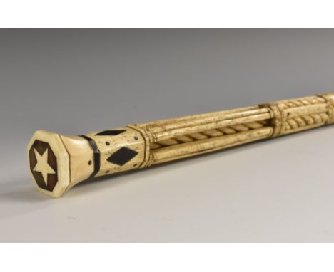 An early 19th century sailor's maritime souvenir novelty whalebone and marine ivory walking stick, octagonal top with an inse