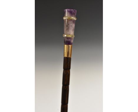 An Art Deco design amethyst, rock crystal and bamboo gentleman's walking stick, tapering specimen shaft intersected with face