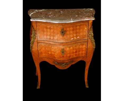 A French Transitional style gilt metal mounted mahogany, rosewood and parquetry bombe shaped commode, marble top above two lo