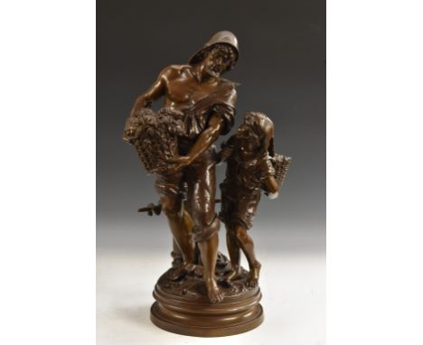 After Moreau, a dark patinated bronze, fisherman and catch with apprentice, signed in the maquette, 62cm high