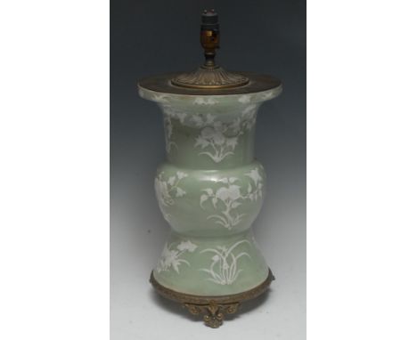 A Chinese Celadon gu-shaped vase, applied and incised in white slip with the Three Friends of Winter, broad girdle, European-