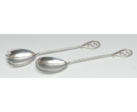 A pair of Art Nouveau silver fruit spoons, the long hafts with sinuous terminals, Fenton Brothers Ltd, Sheffield 1901