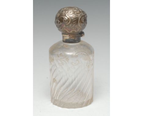 A 19th century silver mounted wrythen glass scent bottle, etched in the Rococo taste with scrolling foliage and trellis, hing