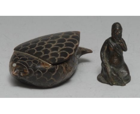 A 19th century novelty horn snuff box, in the form of a fish, 10cm wide, c.1850; a bronzed figure, of a stylised figure, 5.5c
