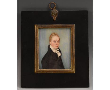 English School (19th century), a portrait miniature, of a young gentleman with curly blond hair cut close, half length, weari