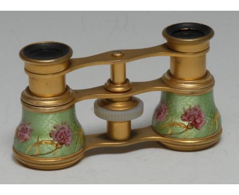 A pair of Art Nouveau guilloché enamel and gilt-metal lady's opera glasses, the ogee prism barrels painted with pink carnatio