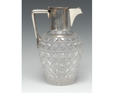 A Victorian silver mounted hobnail ovoid claret jug, hinged cover and cap to spout, angular handle, star-cut base, 20cm high,