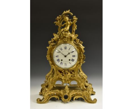 A 19th century French ormolu cartouche-shaped bracket clock, 18cm convex enamel dial inscribed Balthazard, Paris, Roman and s