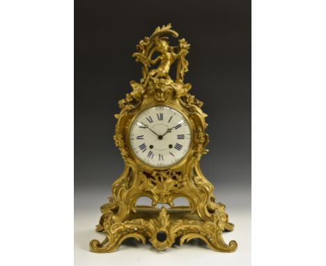 A 19th century French ormolu cartouche-shaped bracket clock, 18cm convex enamel dial inscribed Balthazard, Paris, Roman and s