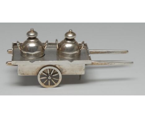 A Chinese silver novelty cruet, as a pair of churns on a handcart, 11.5cm long, character marks, early 20th century
