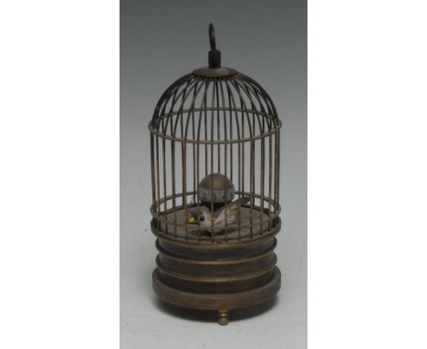A late 19th century French novelty automaton clock, as a bird in a cage, 15cm high, early 20th century