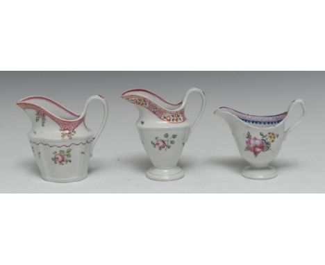 A New Hall helmet shaped jug, decorated in polychrome with stylised flowers, 10cm high, c.1800;  others, N311;  N173 (3)