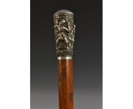 An Anglo-Indian gentleman's silver and malacca walking stick, repoussé handle with Hindu deities in a landscape, lappet and l