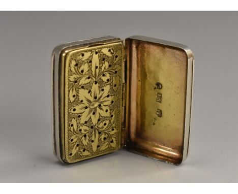 A George III silver rounded rectangular vinaigrette, quite plain, hinged cover enclosing a gilt interior with pierced grille,