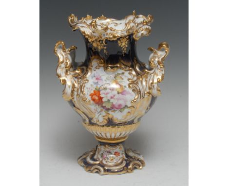 A Coalport Rococo style vase,  painted with colourful summer flowers in relief moulded panel, cobalt blue ground, 25cm high, 