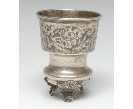 A 19th century Russian silver and niello cup, decorated with a broad band of scrolling leaves, acanthus scroll feet, 9.5cm hi