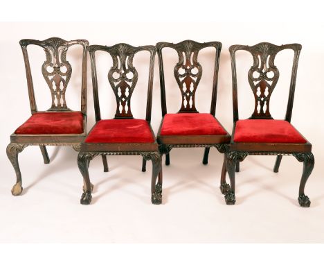 A set of eight Chippendale design mahogany dining chairs, possibly Irish, carved vasular splats, drop-in seats, cabriole fore