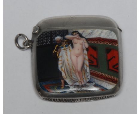 Royal Interest - a Continental silver and enamel vesta case,  finely painted with a slave trader proffering a naked fair skin
