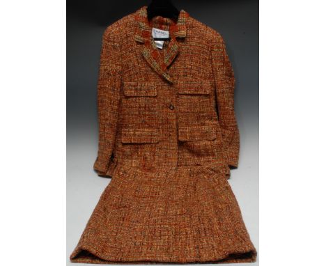 Luxury Fashion - a vintage Chanel two-piece lady's 'tweed' suit, comprising jacket and skirt, faux tortoiseshell buttons, lab
