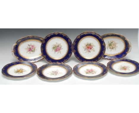 A Coalport eight piece dessert service, comprising two oval serving dishes and six plates, each hand painted with a botanical