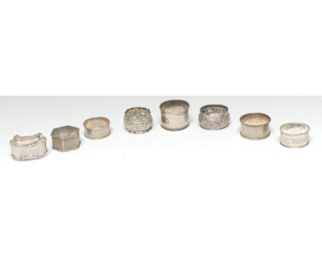 A collection of silver napkin rings, various dates and makers (8)