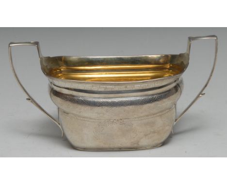 A George III Scottish silver two-handled sugar basin, bright-cut and wriggle-work engraved with wreaths and Greek key, gilt i