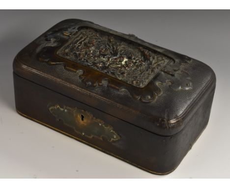 A Victorian electrotype and gilt brass mounted morocco leather workbox, the hinged cover set with a rectangular panel in reli