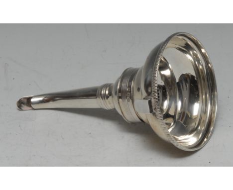 A George III silver wine funnel, gadrooned rim, ogee bowl, curved spout, 14cm long, Solomon Hougham, London 1808, 3oz