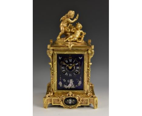 A fine 19th century French ormolu and Limgoes enamel clock, 8cm blue enamel convex rectangular dial inscribed with Roman nume