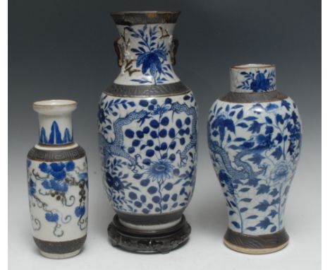 A late 19th century Chinese ovoid vase, decorated in underglaze blue, with scrolling dragon, incised brown band, 38cm high, s