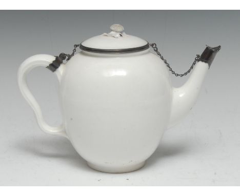 A Mennecy-Villeroy Blanc de Chine silver-mounted ovoid teapot and cover, quite plain, domed cover with flower finial, ear-sha