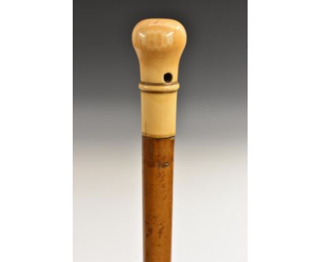 An early 18th century gentleman's ivory and malacca walking stick, turned bulbous handle centred by a raised girdle, silvered