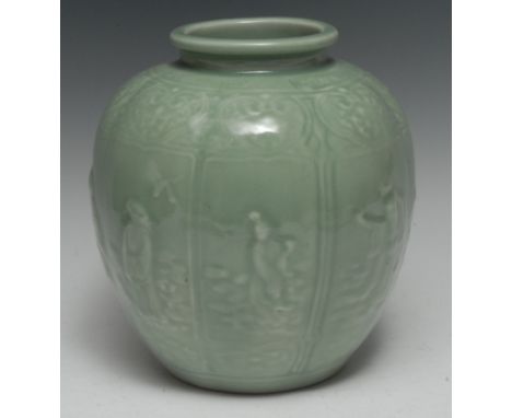 A Chinese celadon glazed ovoid vase, in relief with eight panels each with elders, 25cm high