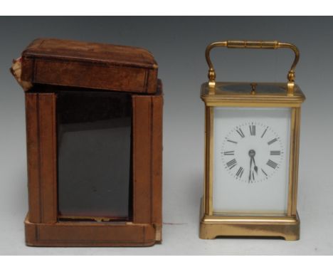 A 19th century brass repeating carriage clock, with Roman numerals, swing handle, bracket feet, leather morocco case, c.1900